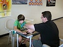 Teaching a lesson on bowstrings